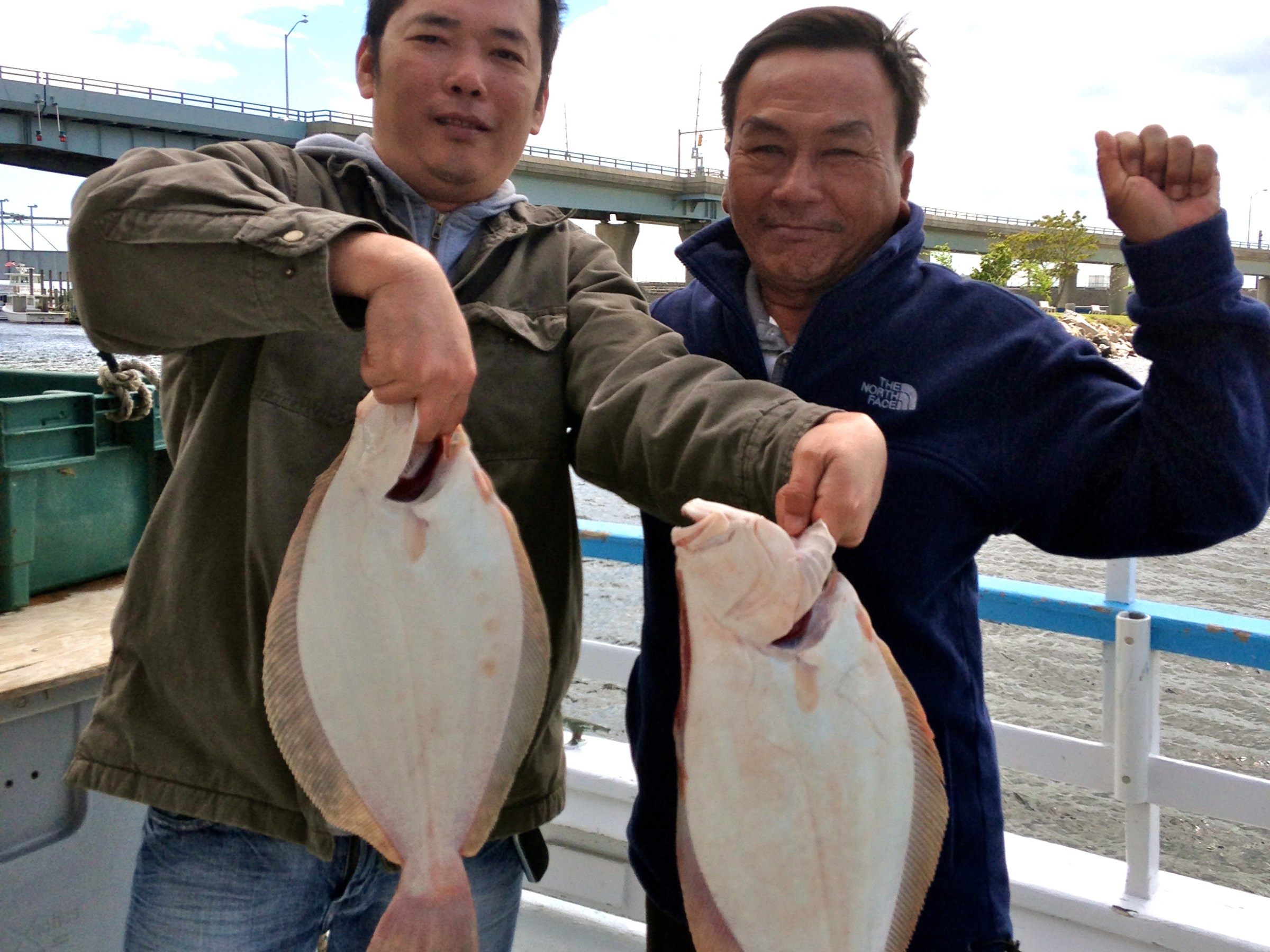 a man holding a fish