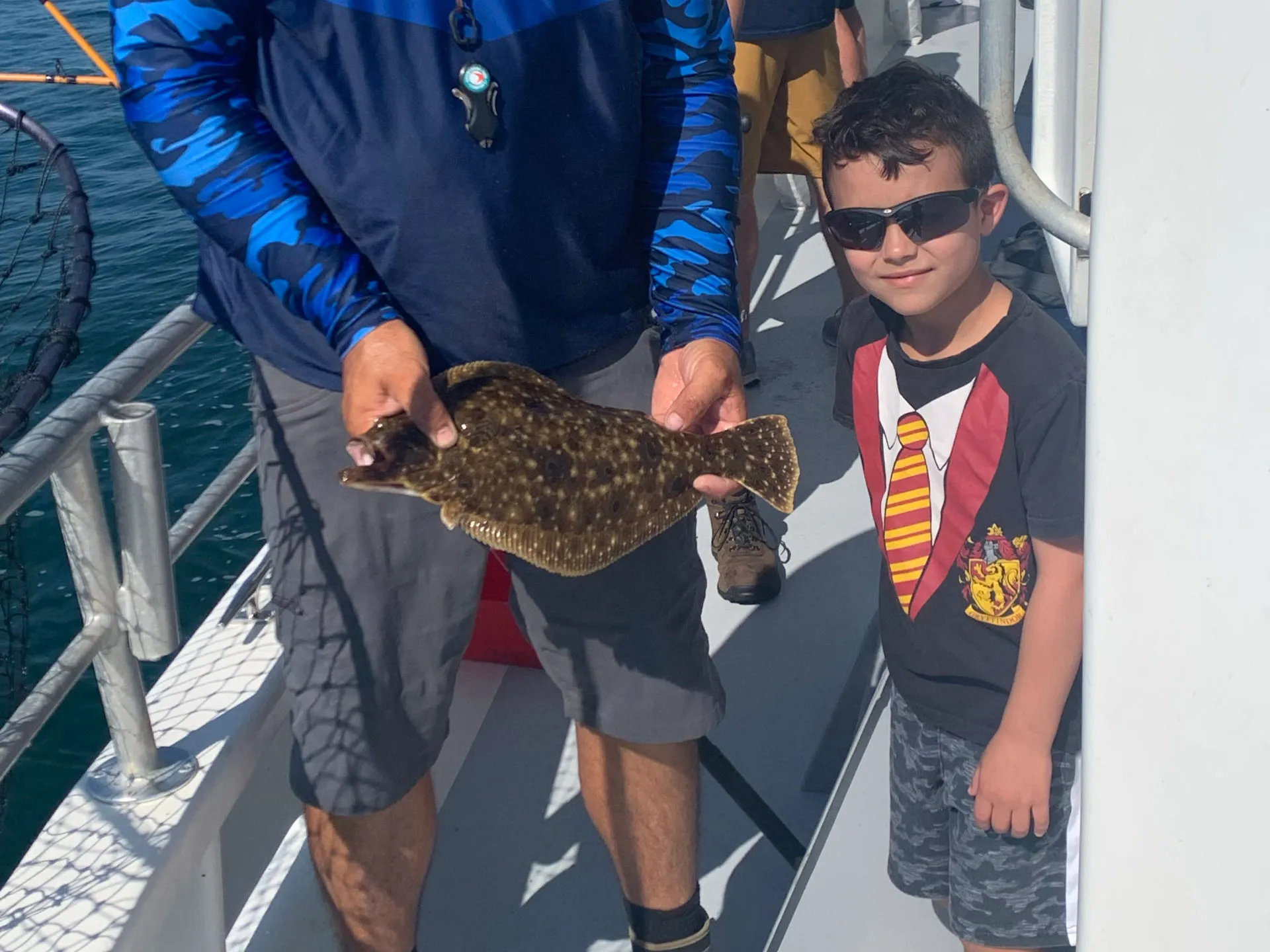a group of people standing next to a man