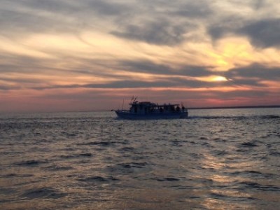 a sunset over a body of water