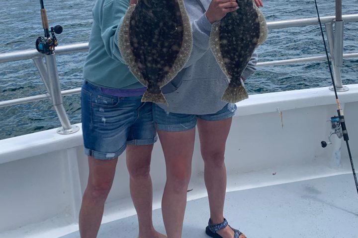 a person standing on a boat in the water